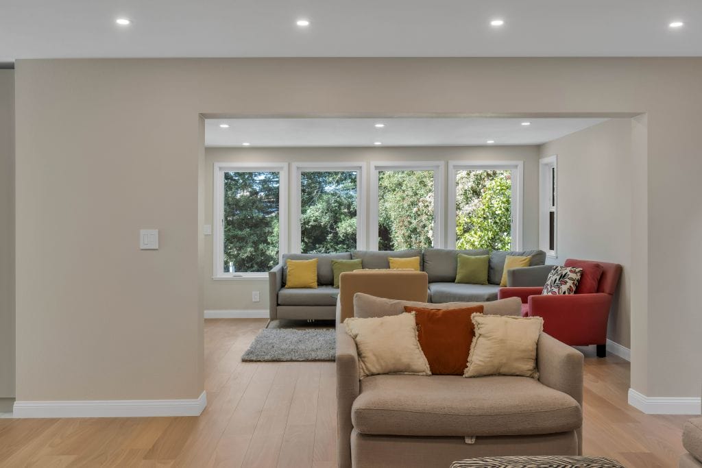 family room addition beige walls wooden flooring denver co