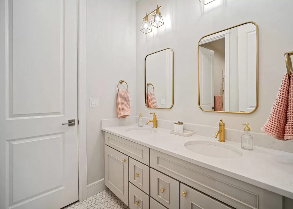 white bathroom gold accents mirrors faucets lights denver co