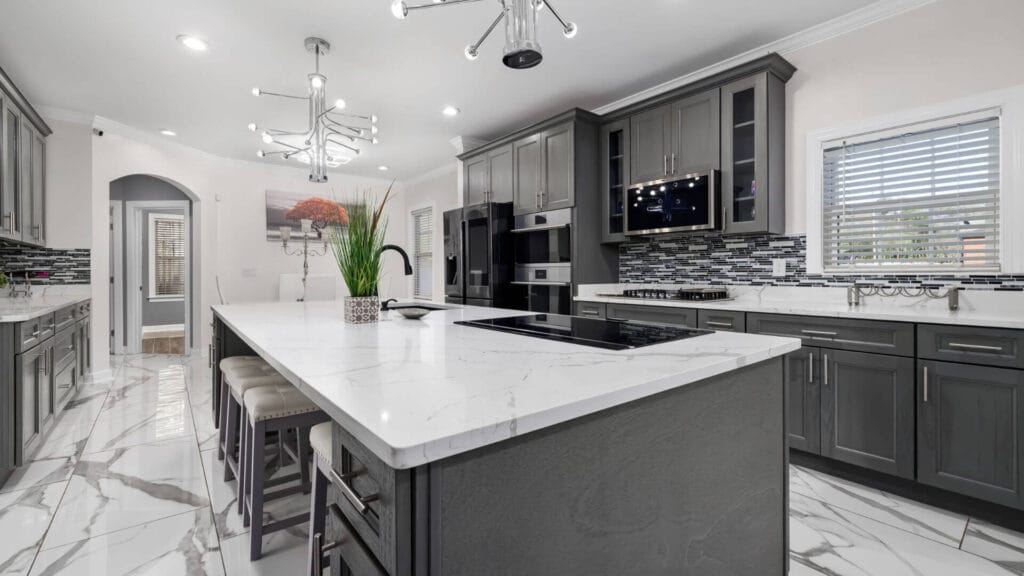 Kitchen with gray and white color scheme. Marble floors.